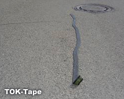 TOK-Asfalttape SK är en plastisk självklistrande tape som är baserad på bitumen
